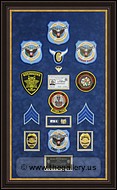 Police Department retirement shadow box
 with police badges, patches, ID cards and lapel pins.
Alpharetta_Frame_Shop.jpg