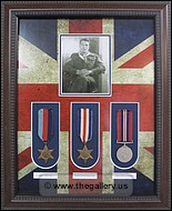 Framed War War 1 medals with photo and Union Jack matting.
American_frame.jpg
