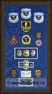 Police Department retirement shadow box with police badges, patches, ID cards and lapel pins.
Austell_frames_and_moulding.jpg