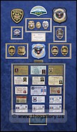 Cobb County Police Department retirement shadow
 box with police badges, patches, ID cards and lapel pins.
Decatur_Mirror_Hanger.jpg