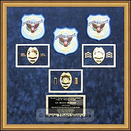 Cobb County Police Department retirement shadow box with police badges, patches, ID cards and lapel pins.
North_Point_Mall_Frame_Shop.jpg