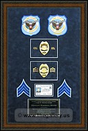 Police Department retirement shadow box with police badges, patches, ID cards and lapel pins.
Vinings_Frame_Shop.jpg