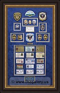 Cobb County Police Department retirement shadow box with police badges, patches, ID cards and lapel pins.
woodstock_shadowbox_framer.jpg